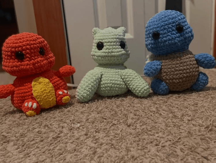 Handmade crochet character plush with a star motif